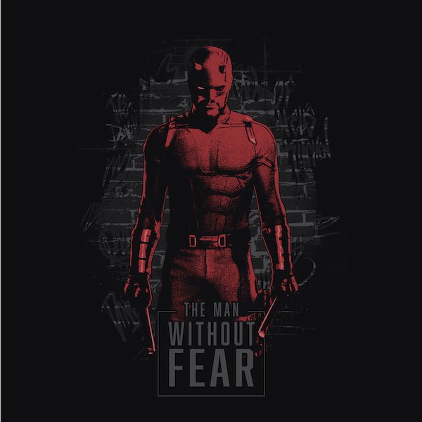 A stylized illustration of Daredevil, the Marvel Comics superhero, standing against a dark, graffiti-covered brick wall. His red suit is highlighted in a gritty, high-contrast design with shadows obscuring parts of his face. He holds his signature billy clubs in each hand, exuding a strong and fearless stance. The words 'THE MAN WITHOUT FEAR' are prominently displayed at the bottom