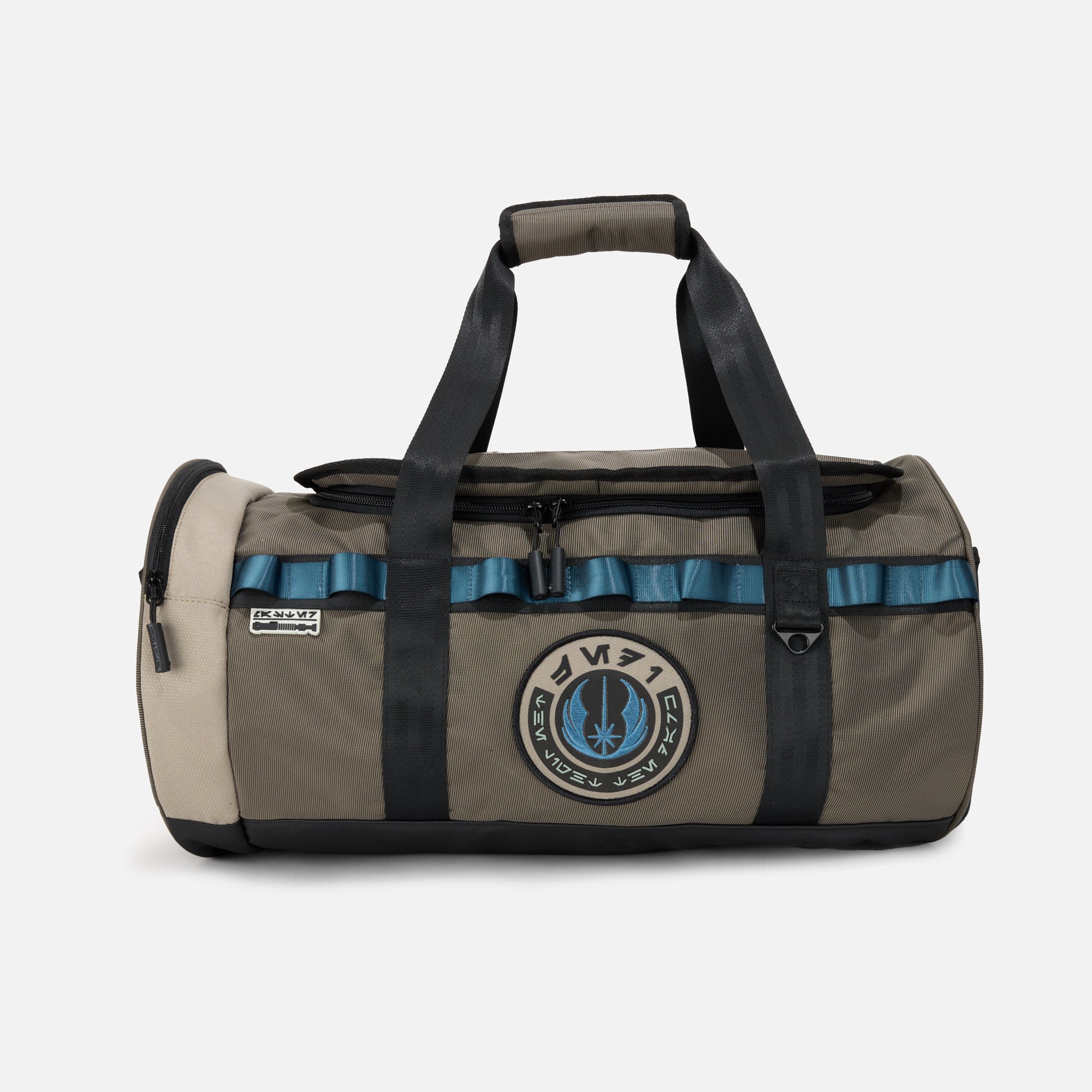 Rugged duffle bag in earthy tones with black straps, blue accent detailing, and a durable design. Features multiple compartments, reinforced handles, and an adjustable shoulder strap for versatile carrying.