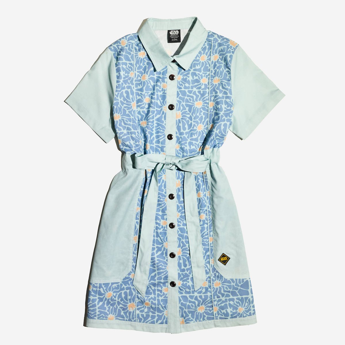 A blue button down star wars rebel dress with 60s inspired patterns