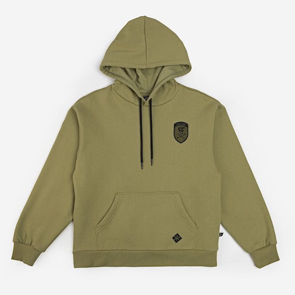 Green Hoodie with Kangaroo Pocket and Hood. The Hoodie has a patch on the right chest area and black strings to tighten the hood