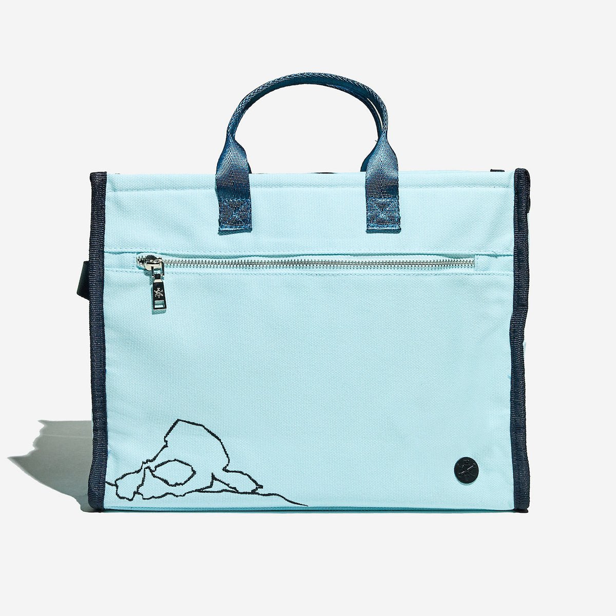 Light blue bag with dark blue handles and trim on a white background