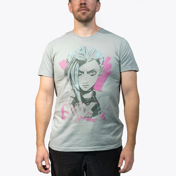 Male Model in a Blue T-Shirt featuring a faded graphic of Jinx from Arcane