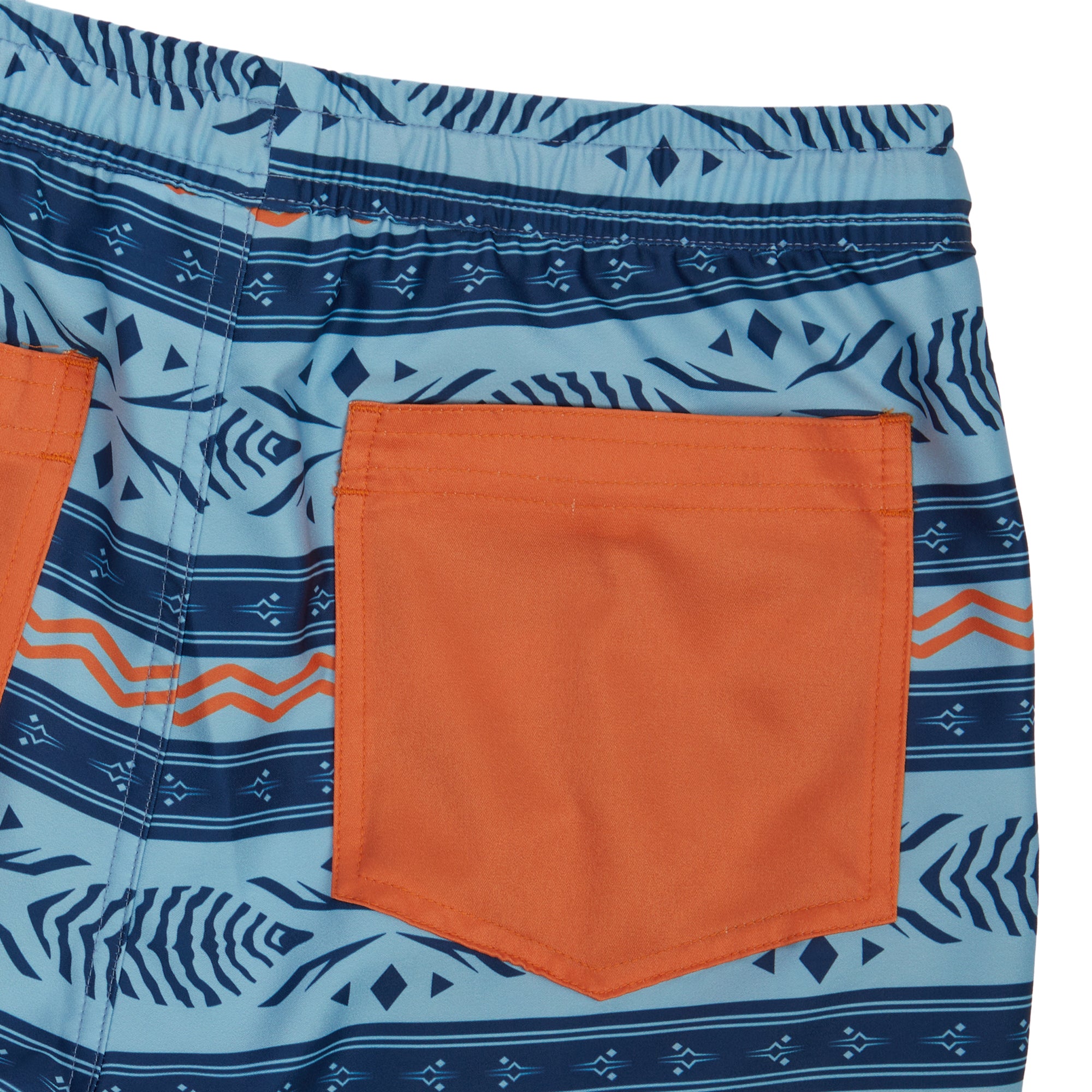 Ahsoka Board Shorts with blue tribal pattern and orange back pocket, quick-dry, drawstring waist, and side pockets.