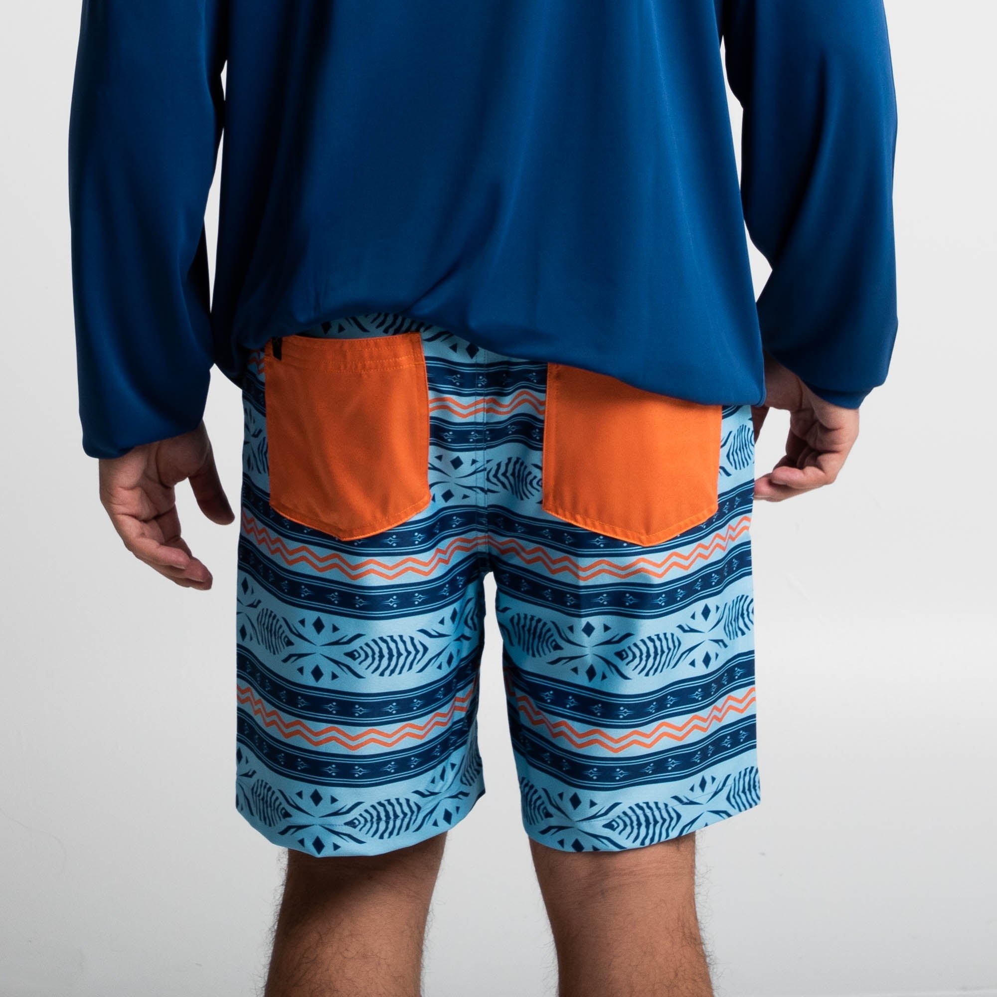 Ahsoka Board Shorts featuring blue patterned fabric with orange back pockets, quick-dry, 4-way stretch, drawstring waist.