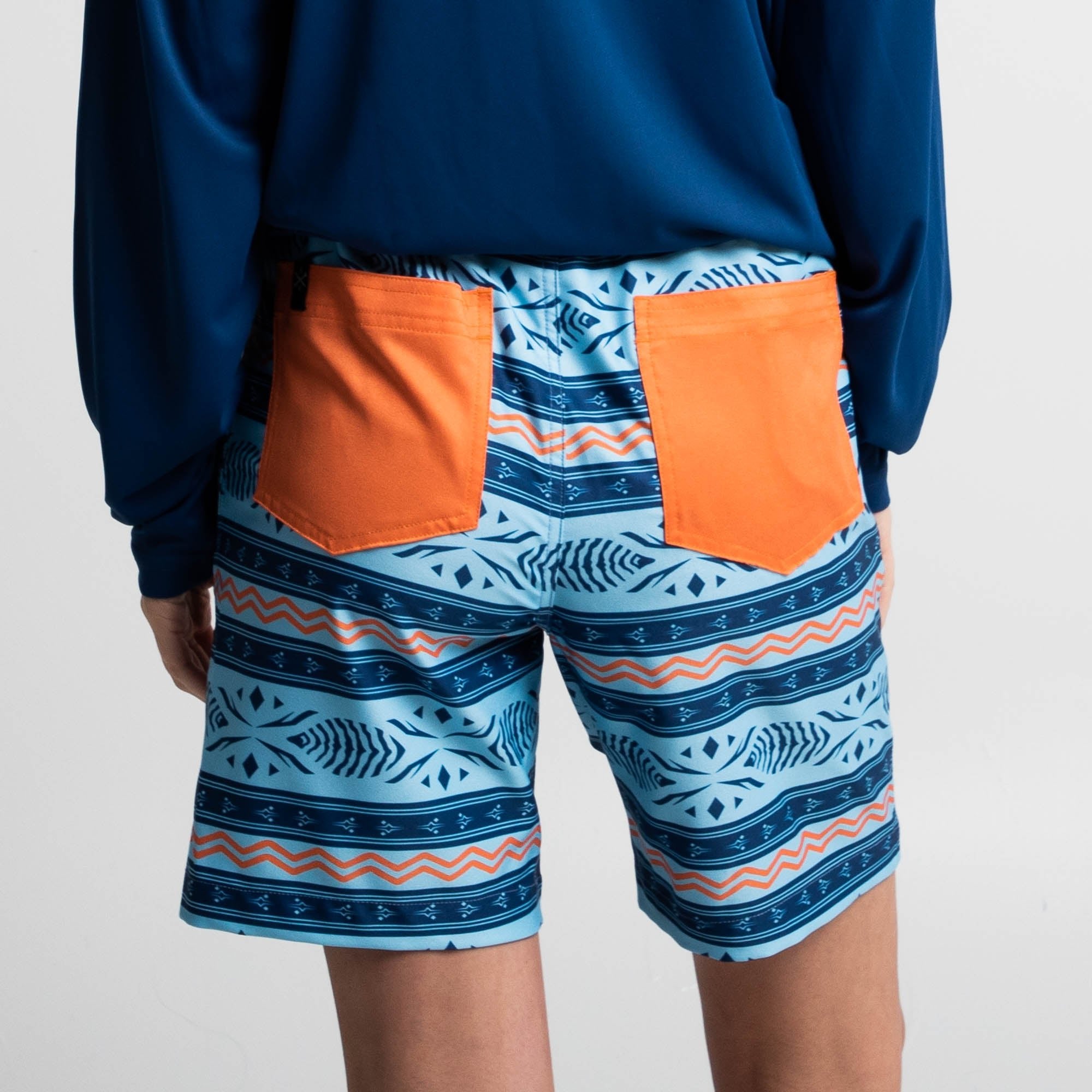 Ahsoka Board Shorts with blue and orange pattern, back pockets, side slits, drawstring waist, and quick-dry fabric.