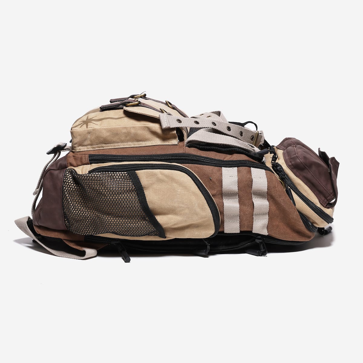 Multicolored backpack with brown, beige, and black straps on a white background