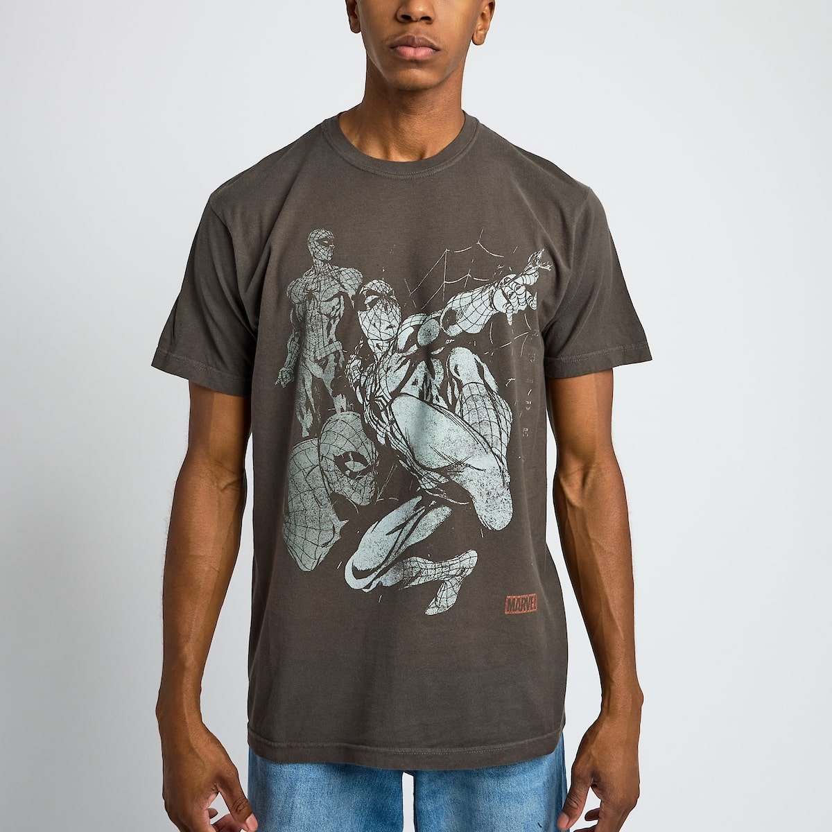 Person wearing a t-shirt with Spider-Man graphic design