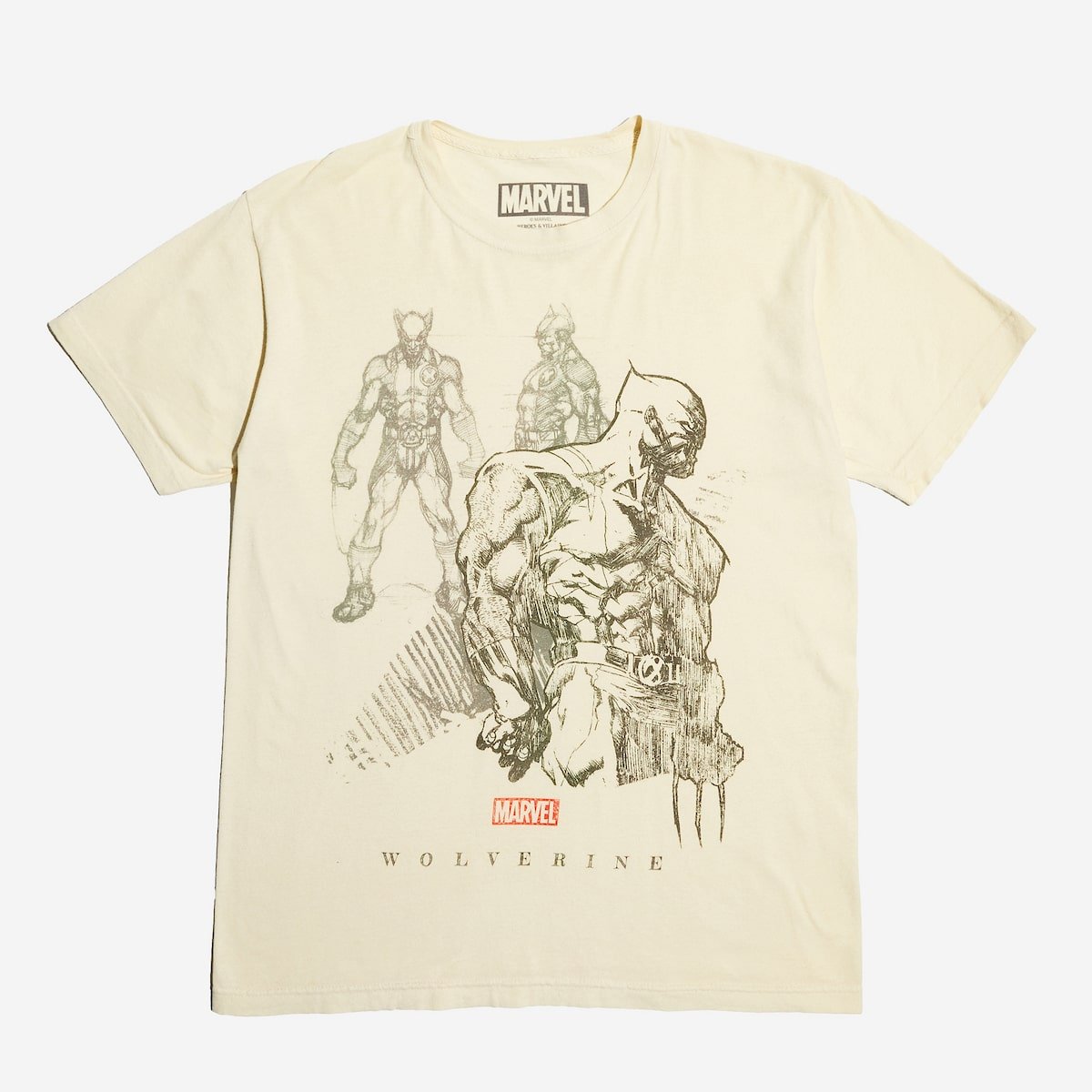 Beige t-shirt with Marvel Wolverine graphic design on a white background
