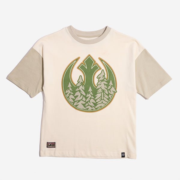 A short sleeved color block t-shirt. The sleeves and collar are tan while the remainder of the shirt is cream colored. The tshirt has a large screen print of the Star Wars Rebel emblem with a wooded overlay. There is a small rectangle patch on the bottom left side that says "Rebels of" at the top and "alderaan" at the bottom. Between the words is a small detailed photo of a forest and mountains.