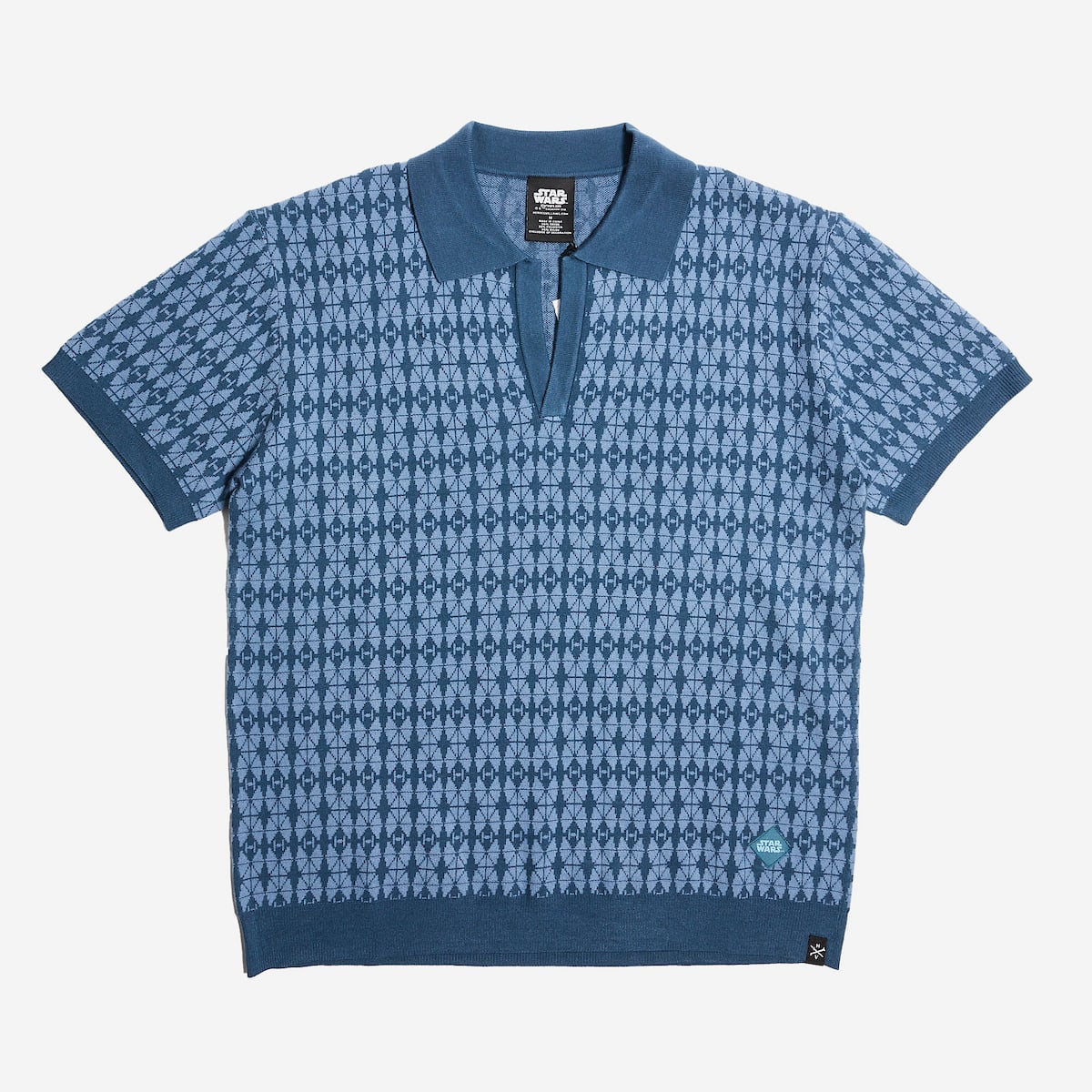 Blue patterned polo shirt on a white background