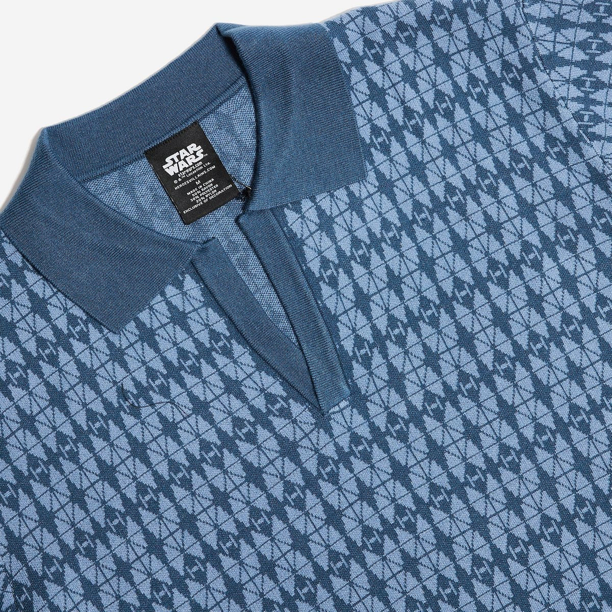 Blue star wars patterned shirt with a visible brand label on a white background