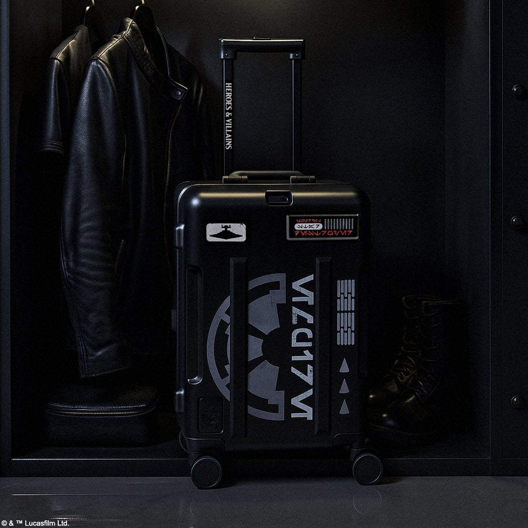 Black Star Wars suitcase with 'Tie Fighter' branding on a dark background