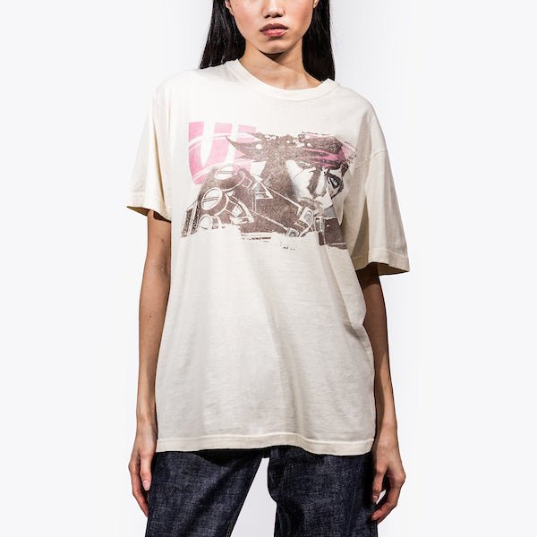 Female in a white tshirt featuring a graphic of Vi from Arcane