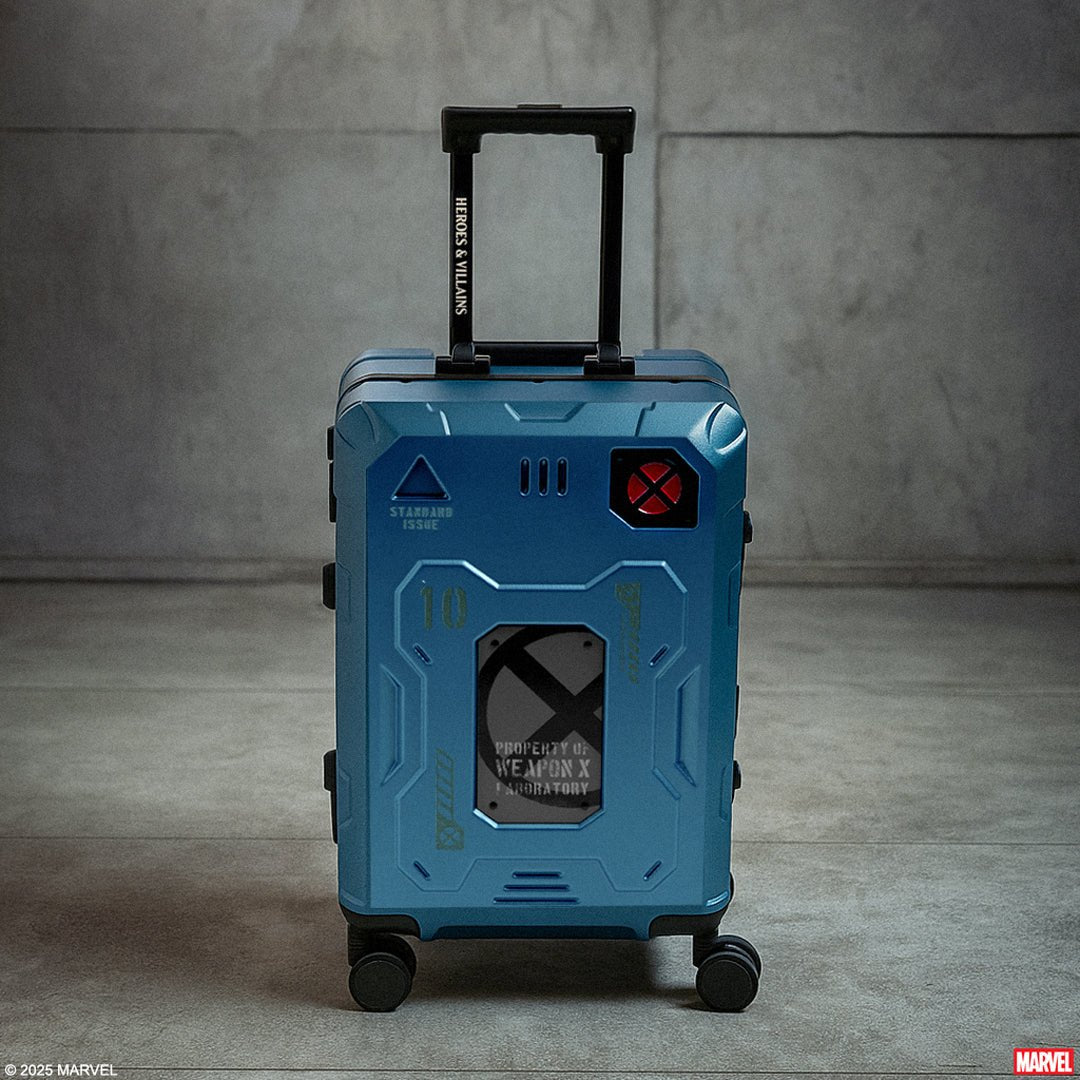 Blue suitcase with X-Men logo on a gray background