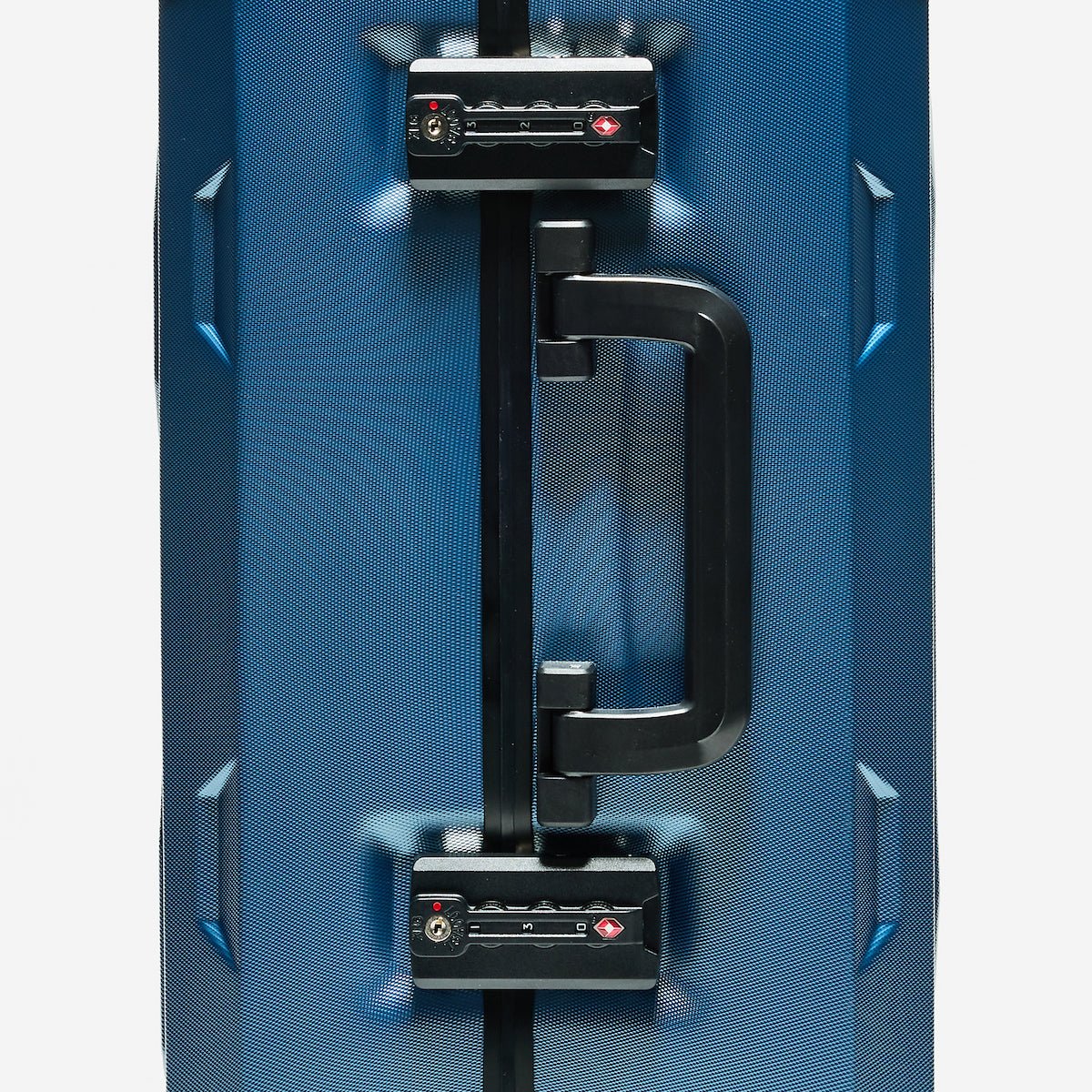 Blue suitcase with black handle and locks on a white background