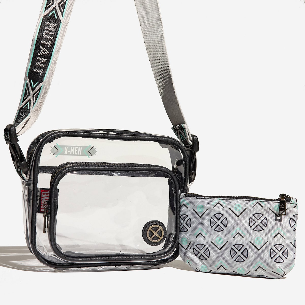 Clear crossbody bag with patterned pouch on a white background