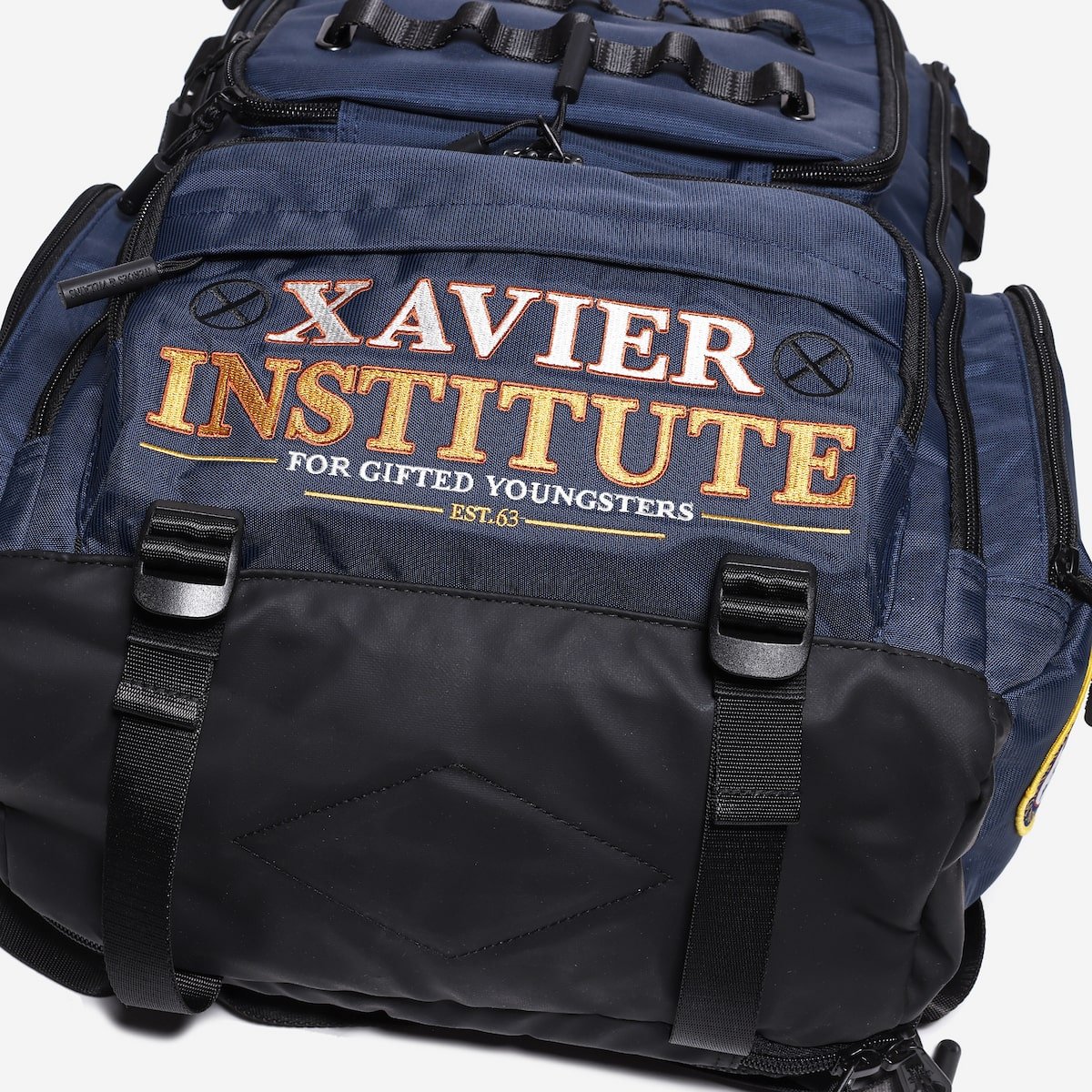 Backpack with 'Xavier Institute for Gifted Youngsters' text on a white background