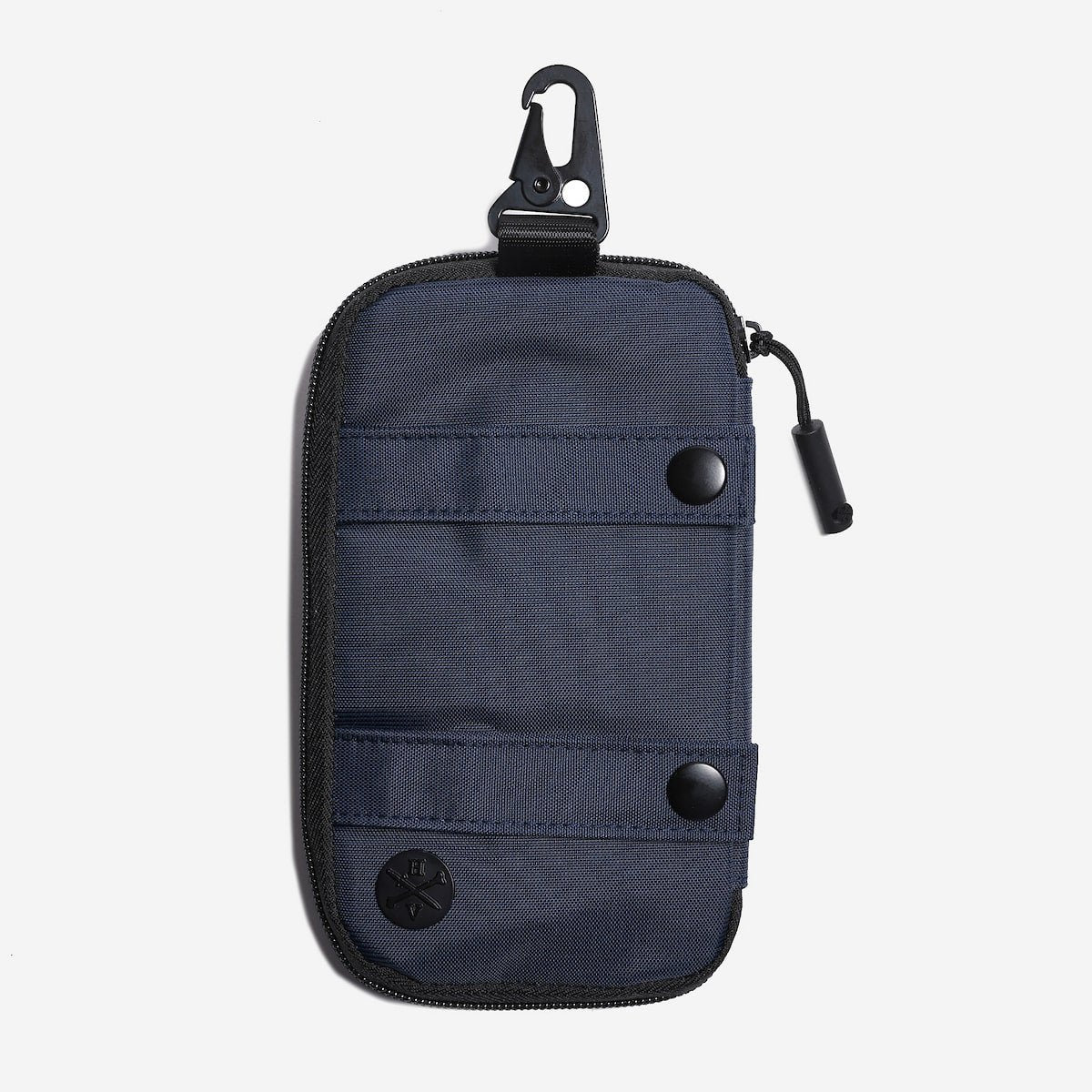 Navy blue pouch with zippers and a carabiner on a light gray background