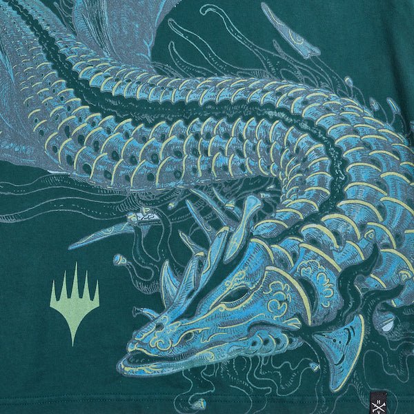 Close-up of Teval dragon graphic on Magic: The Gathering Grail Premium dark green t-shirt