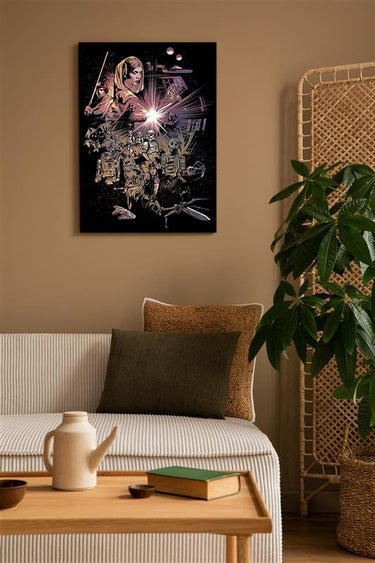 Living room with a canvas on the wall, a couch, and a plant.