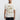 Man in a beige tee with Blueprint-style illustration of vehicles and diagrams for an Atlantis expedition.