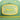 Green star wars cap with a yellow patch with green text reading top to bottom "Parts and Service" "Watto's" "Junk & Salvage" on a white background