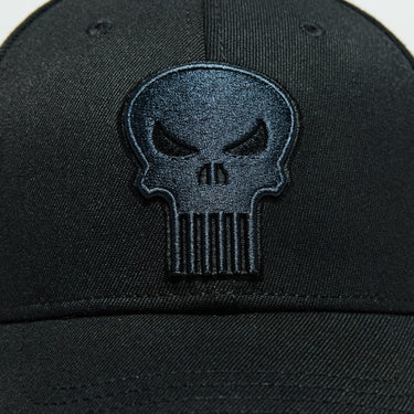 Close up of a Black Flex Fit Hat with The Punisher Skull Logo in black with monocromatic black stitching
