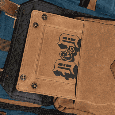 GIF Showing Dice Tray included with the D&D Quest Backpack being pulled out of the pocket and snapped into shape