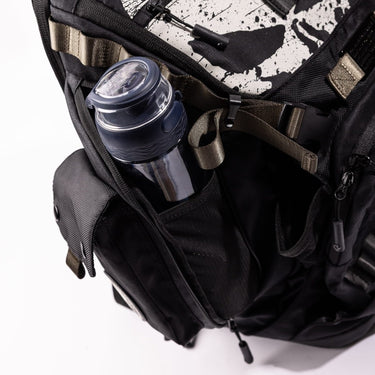 Black backpack with a water bottle inside on a white background