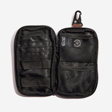 Black tactical pouch with multiple compartments and a carabiner on a white background