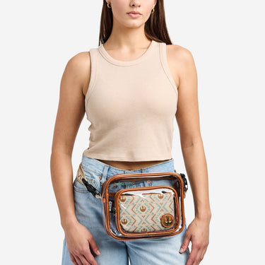 Woman wearing a star wars rebel patterned waist bag on a white background