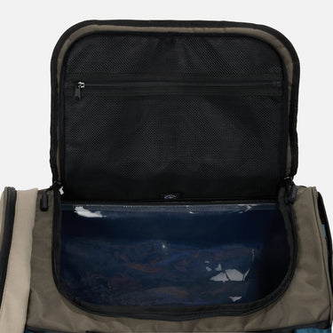 Rugged duffle bag in earthy tones with black straps, blue accent detailing, and a durable design. Features multiple compartments, reinforced handles, and an adjustable shoulder strap for versatile carrying.