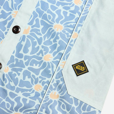 Close up of a blue star wars rebel dress with 60s inspired patterns