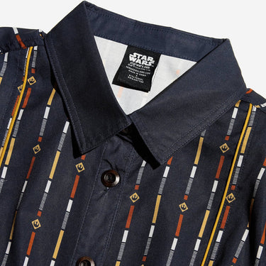 Close up of a button up navy dress thats star wars rebel inspired with a striped pattern 