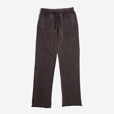 Black sweatpants with an elastic waistband and black drawstring, featuring a small black Empire logo near the left pocket and a vertical "Empire" graphic printed in distressed black text along the lower left leg.