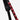 The photo shows a close up detailing of the shoulder strap. Featured is the Red decorative detailing. The detailing has loops for attaching clips and a tech case. The top loop has a "D"-Ring attached.