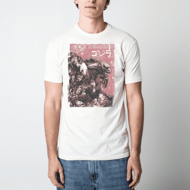 Man in an Off-White t-shirt with a graphic design of Godzilla and Japanese text on a white background