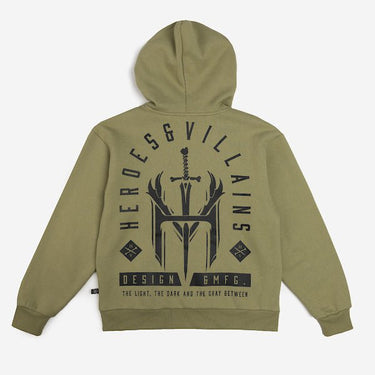 The picture shows the back of a green hoodie. The print on the back is in a tombstone shape and features a large logo of an "H" and "V" with a dagger going through. The words "Heroes & Villians" arch over the design in an arch shape. 