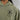 Green hoodie with 'Warriors of Mandalore' logo on a plain background