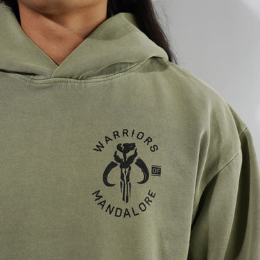 Green hoodie with 'Warriors of Mandalore' logo on a plain background