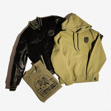 Black leather jacket, green hoodie, and green t-shirt with branding on a white background