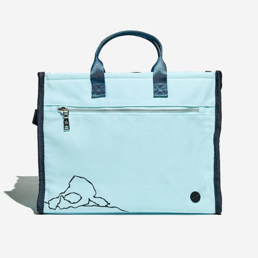 Light blue bag with dark blue handles and trim on a white background