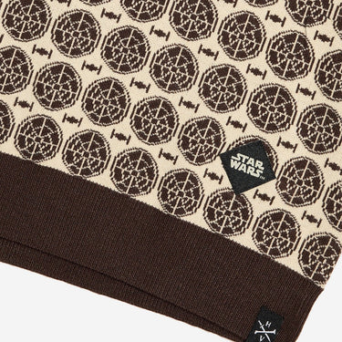 Star Wars patterned fabric with logo on a beige background