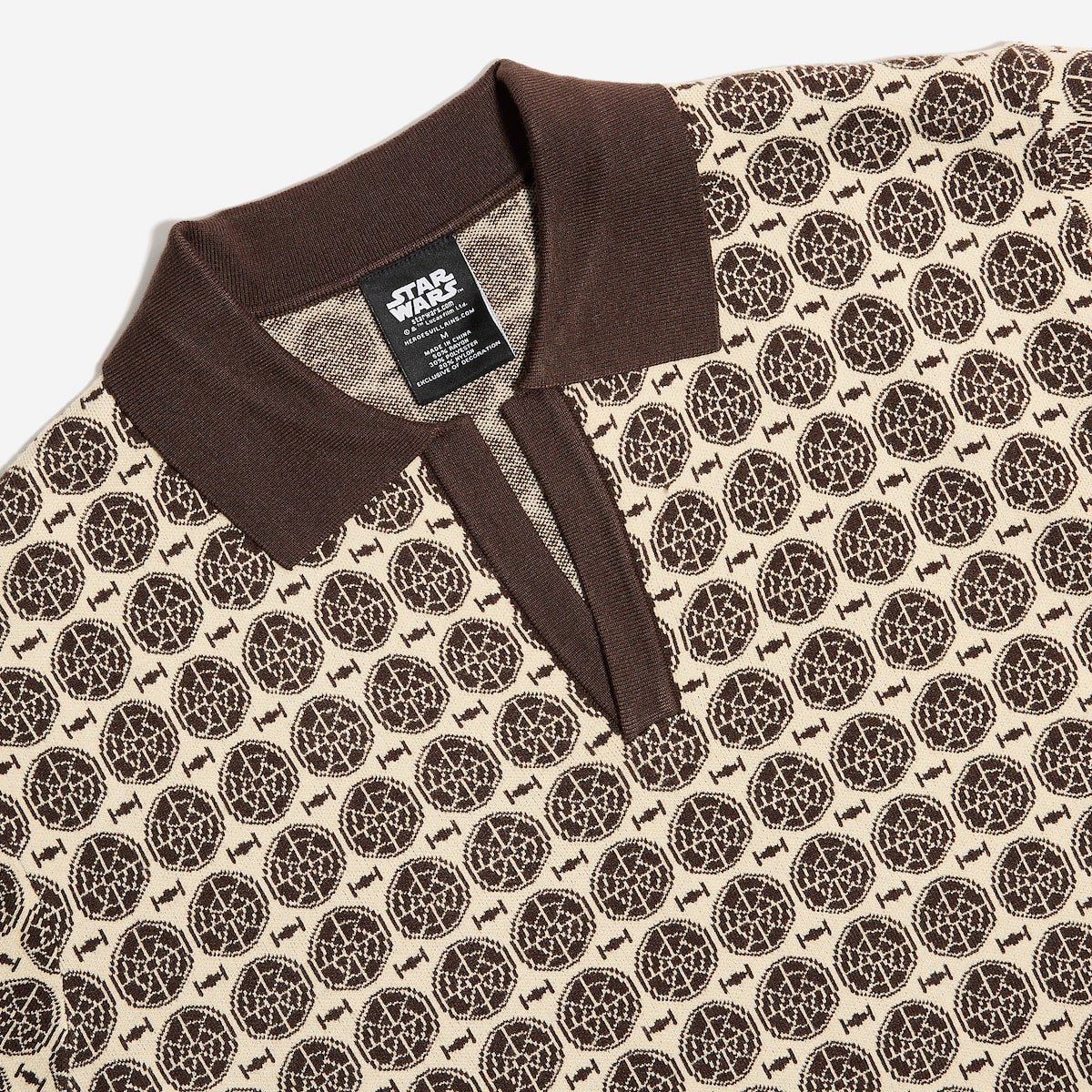 Patterned shirt with a visible brand label on a plain background