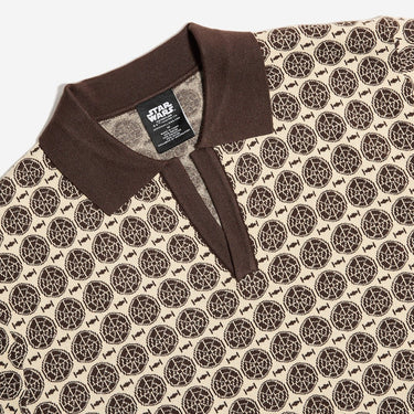Patterned shirt with a visible brand label on a plain background