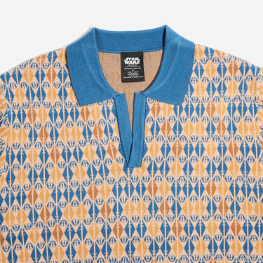Patterned shirt with blue collar and Star Wars label on a white background