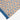 Patterned fabric with blue and orange design on a white background