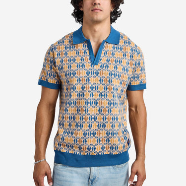 Man wearing a jedi patterned polo shirt with blue accents on a white background