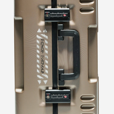 Close-up of a suitcase handle and lock mechanism 