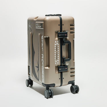 Beige suitcase with black Jedi Themed  accents on a light gray background